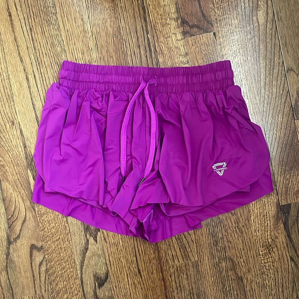 Flowy workout shorts with tight shorts layer under, soft and stretchy material